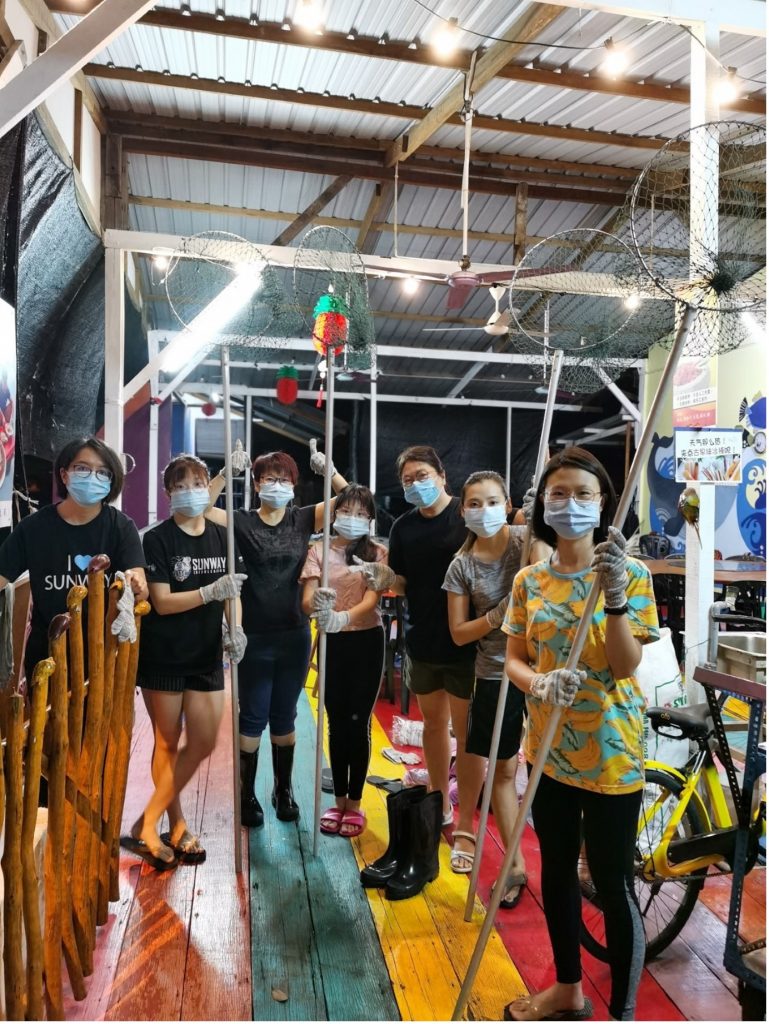 A group of people wearing masks